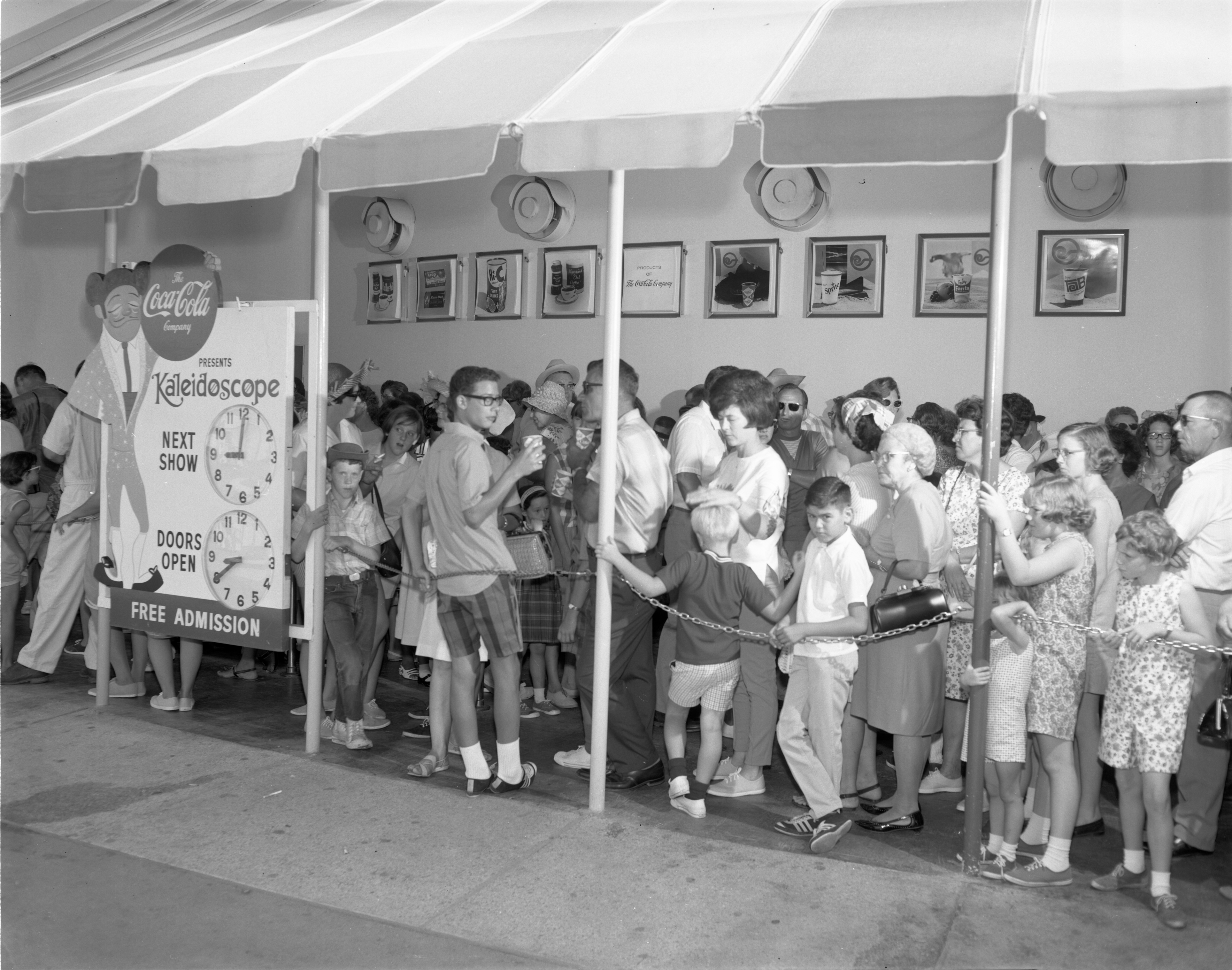 Black and white photograph of the audience line for the 9 a.m. performance of the Sid and Marty Krofft puppet show "Kaleidoscope"