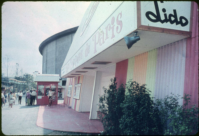 Color photograph of the colorful exterior of the Lido Theatre at Hemisfair '68. The marquee reads